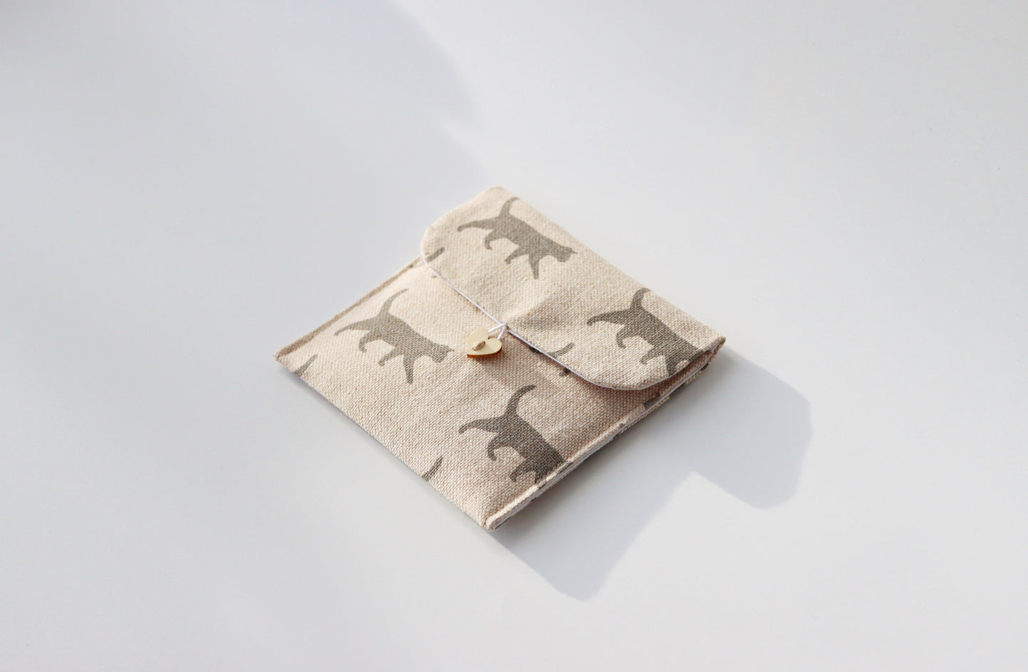 cat-themed sanitary pad pouch