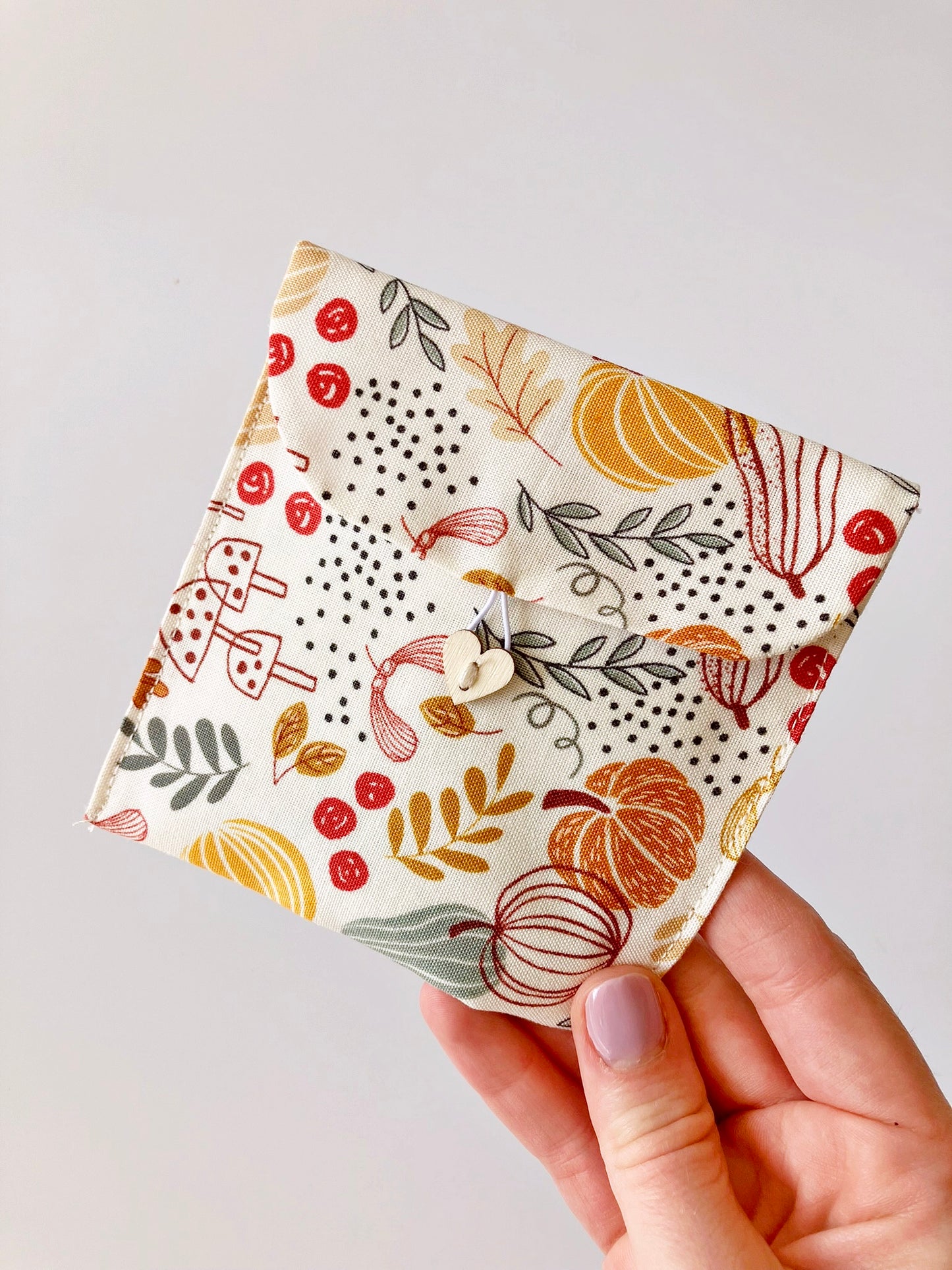 autumn-themed sanitary pad pouch